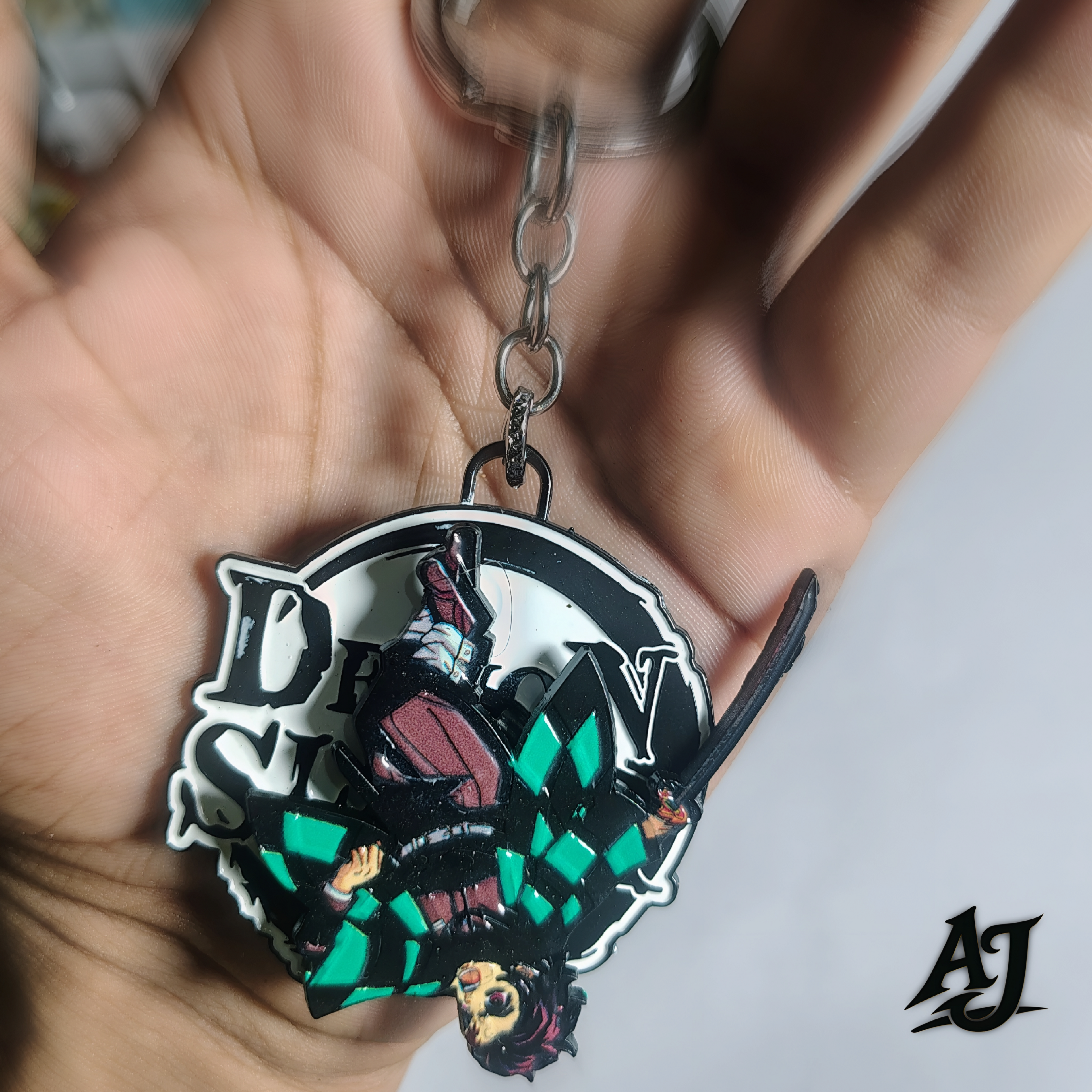 DEMON SLAYER~ROTATING METAL KEYCHAIN